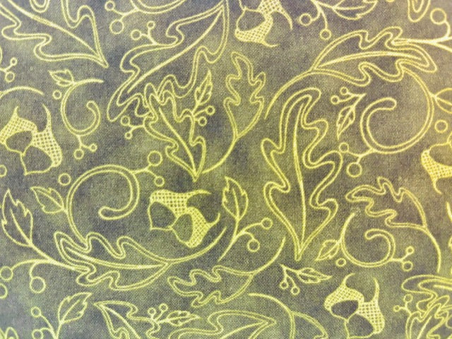 ANGELA ANDERSON FOR QUILTING TREASURES fondo verde hojas y bellotas