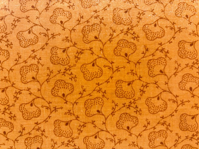 HOJAS CON FONDO NARANJA