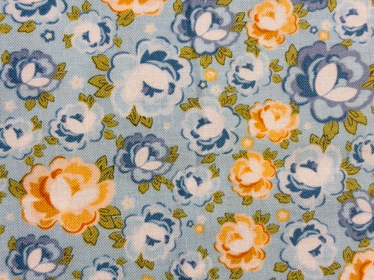 ROSY CHEEKS, FLORES AZUL Y AMARILLO  FONDO AZUL