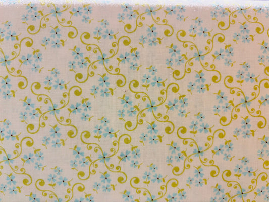 VINTAGE BABY BY LORI fondo blanco con flores azul y verde